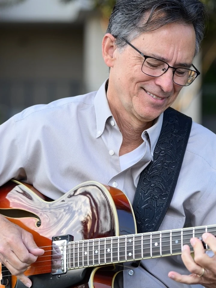 Chip Gulbro with guitar